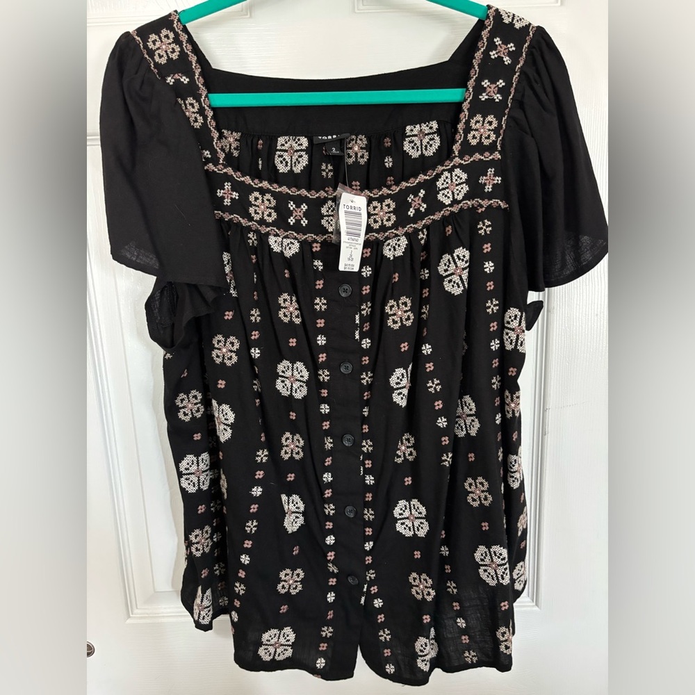 Torrid short sleeve top, new with tags.